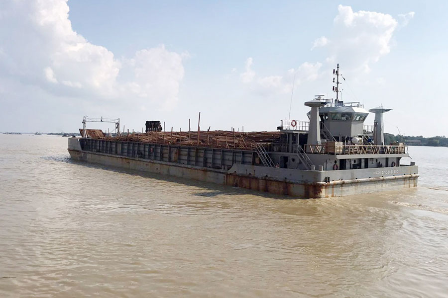 A Sittwe-bound junta ship loaded with construction materials. (Photo: Rakhine Daily)