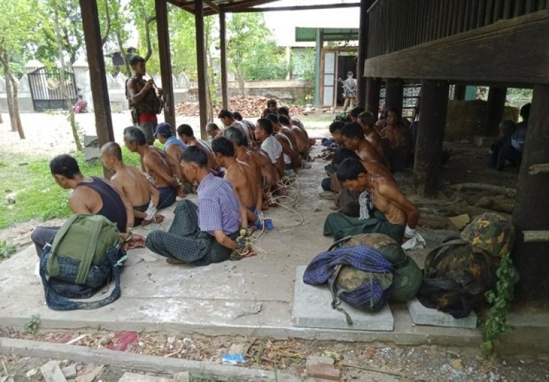 Around 30 civilians detained and tied up by the Myanmar military on May 10, 2022. (Photo: RFA)