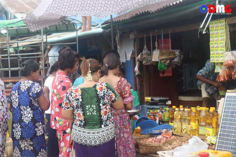 Residents buy food at Sittwe’s central market on Friday.