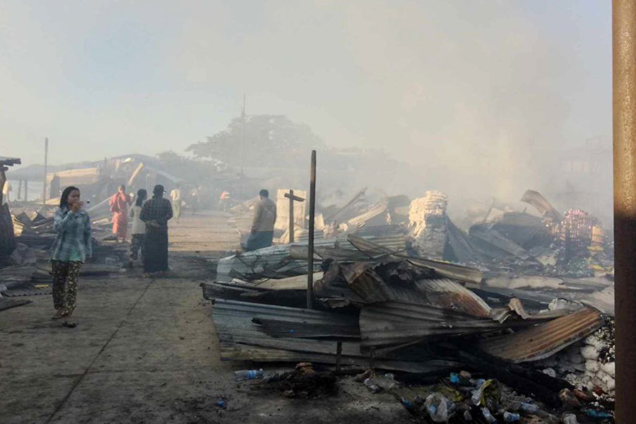 The central market in Ponnagyun Town, reduced to ashes by junta artillery attacks, is pictured on November 25, 2023.