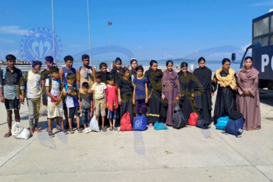 Muslim refugees arrested in Rathedaung Township for allegedly crossing the border illegally are pictured on October 31. (Photo: Rakhine Daily)