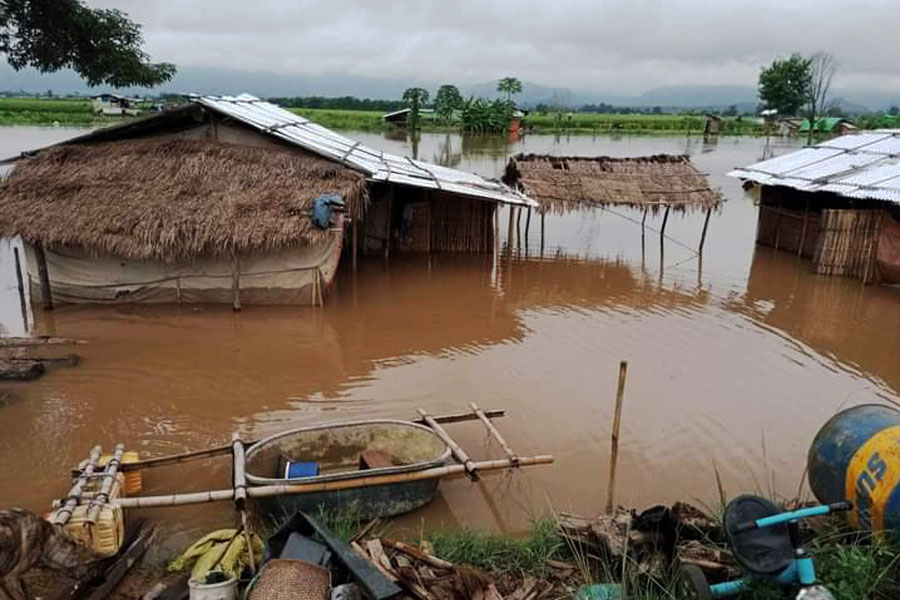 Some IDP shelters submerged by floodwaters on farmland near the Belu Creek are pictured on October 11. (Photo: CJ)