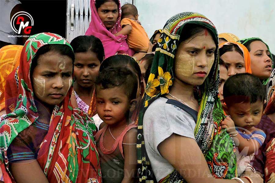 Hindu women and children displaced by the 2017 Maungdaw violence are seen at Danyawadi relief camp in Sittwe.