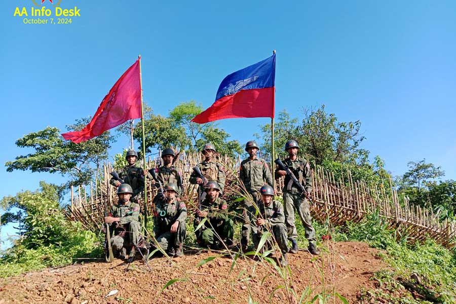 Arakkha Army (AA) fighters are pictured after capturing the Mt. Mel tactical command base in Ann Township, Arakan State. (Photo: AA Info Desk)