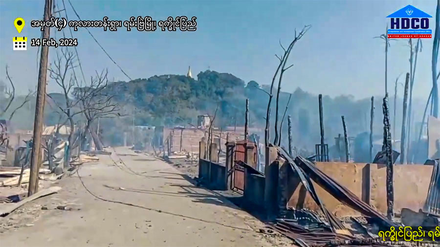 Homes that caught fire due to a junta airstrike during the battle for Ramree are pictured on February 14. (Photo: HDCO)