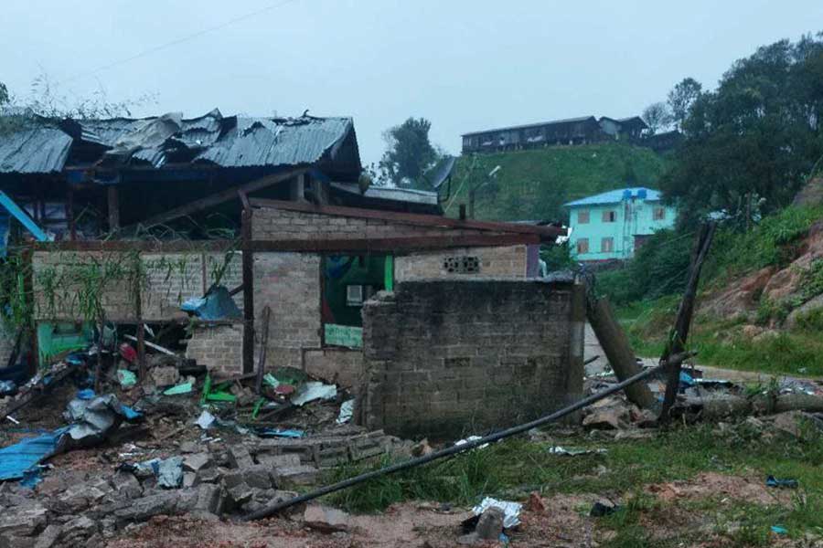 A civilian was killed and some homes were destroyed by the regime airstrike on Namhsan on August 12. (Photo: TNLA)