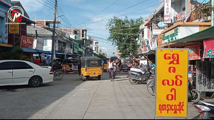 Gold shops in Sittwe are pictured in October 2023.