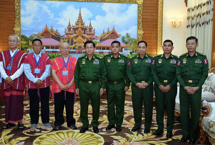 Regime members meet with the former leader of the KNU in Naypyidaw on September 30, 2023.