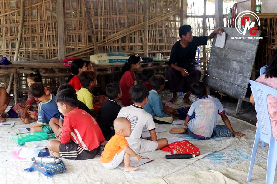 Displaced children studying at a temporary classroom in Kyauktaw Township, Arakan State, earlier this year.